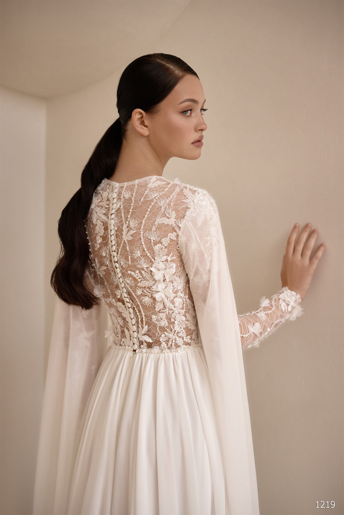 Elegant Wedding Dress with Lace Sleeves & Statement Cape