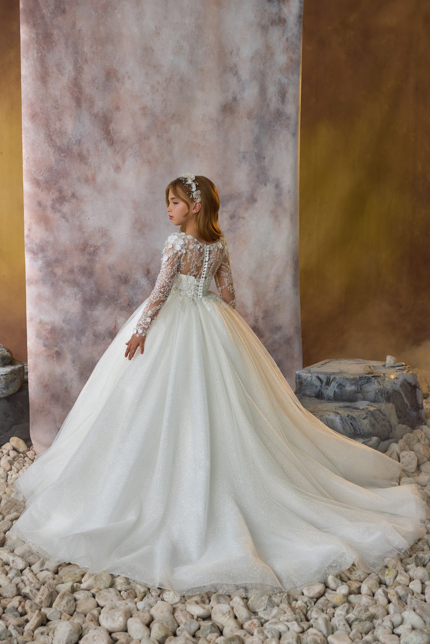 Pentelei 3719 gown with intricate lace sleeves, floral appliques, and golden shimmer skirt  | Girls Formal Dress