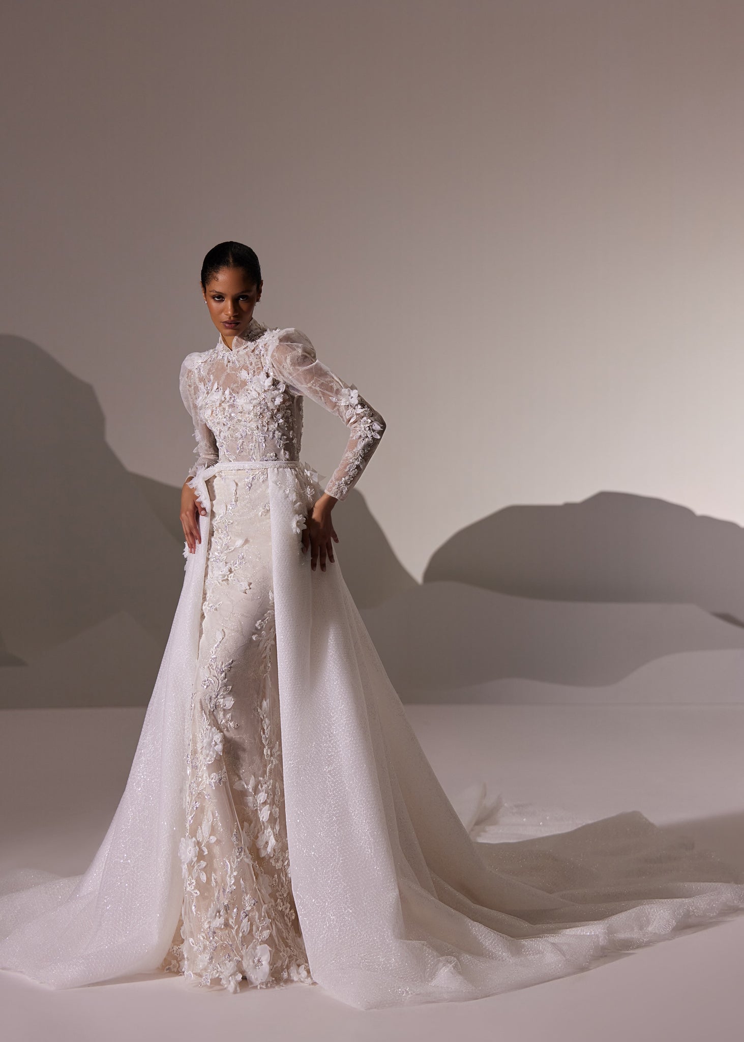 Elegant High-Neck Lace Bodice Bridal Gown with Cascading Train and Detachable Overskirt | Marelli Exclusive Elegant High-Neck Lace Bodice Bridal Gown with Cascading Train and Detachable Overskirt | Marelli Exclusive