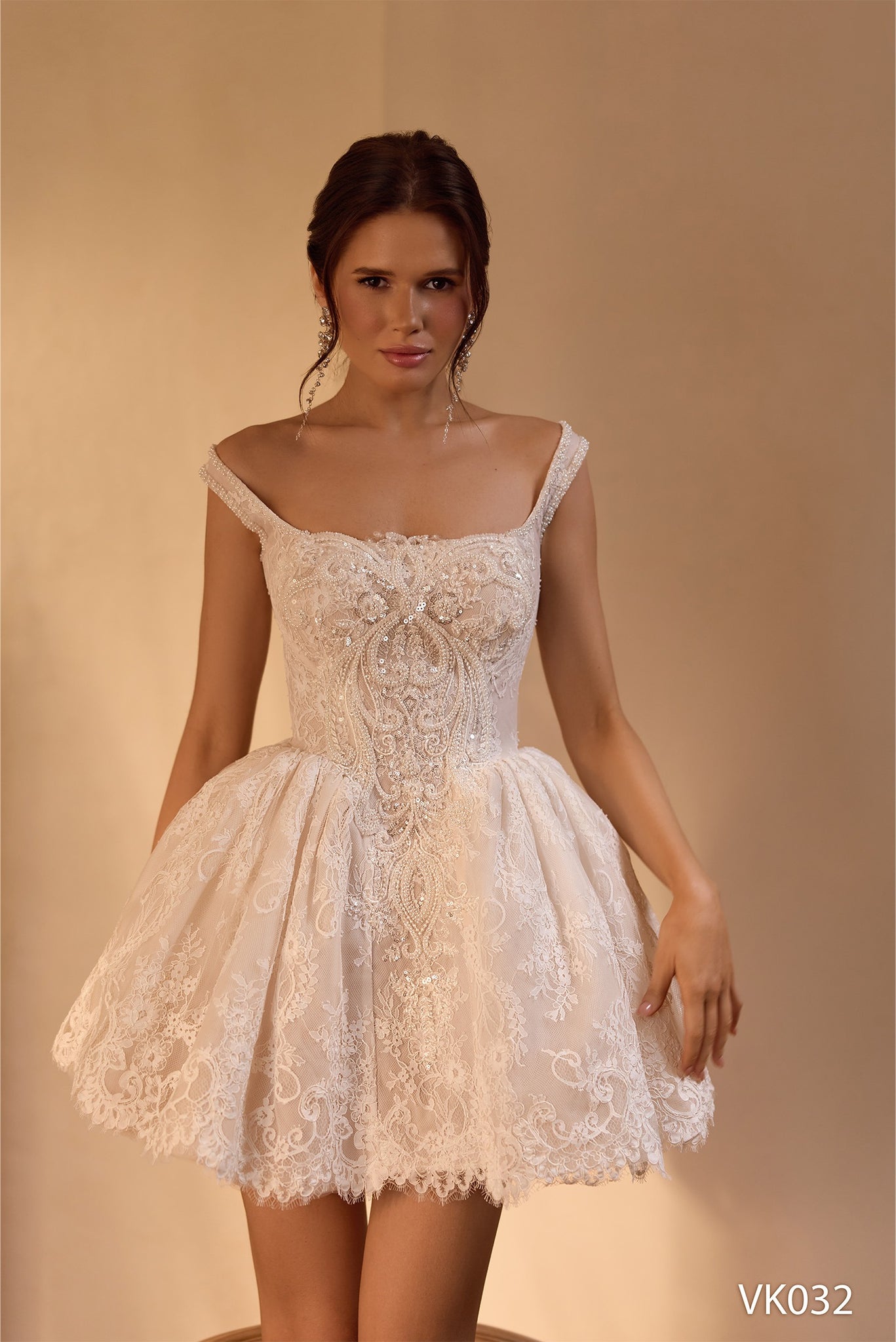 Off-shoulder bridal mini dress with embellished corset bodice and voluminous lace skirt