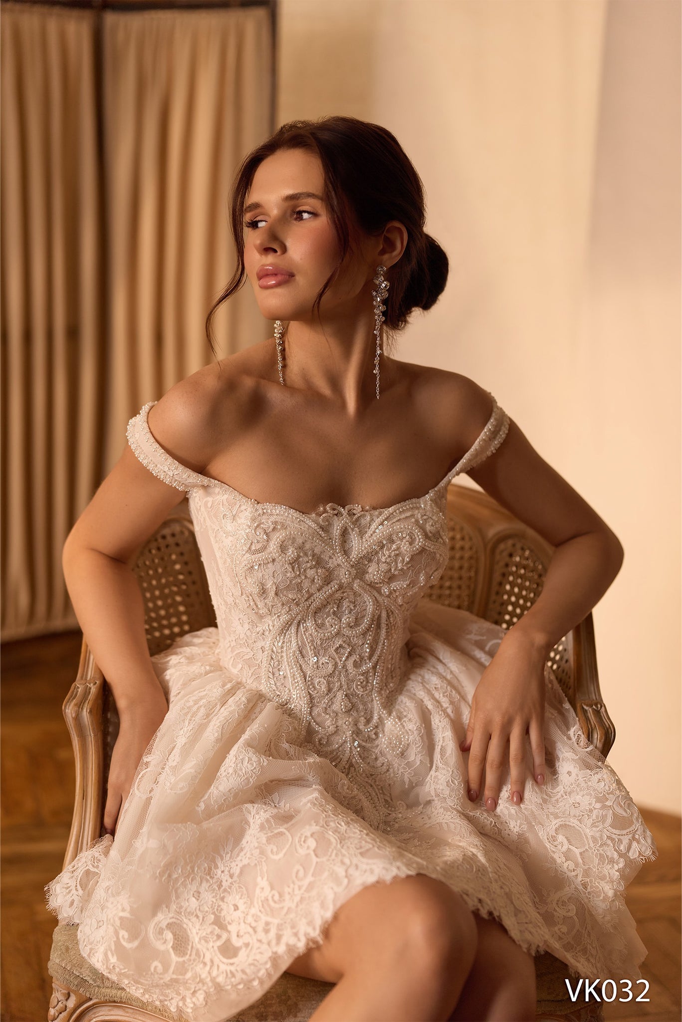 Off-shoulder bridal mini dress with embellished corset bodice and voluminous lace skirt