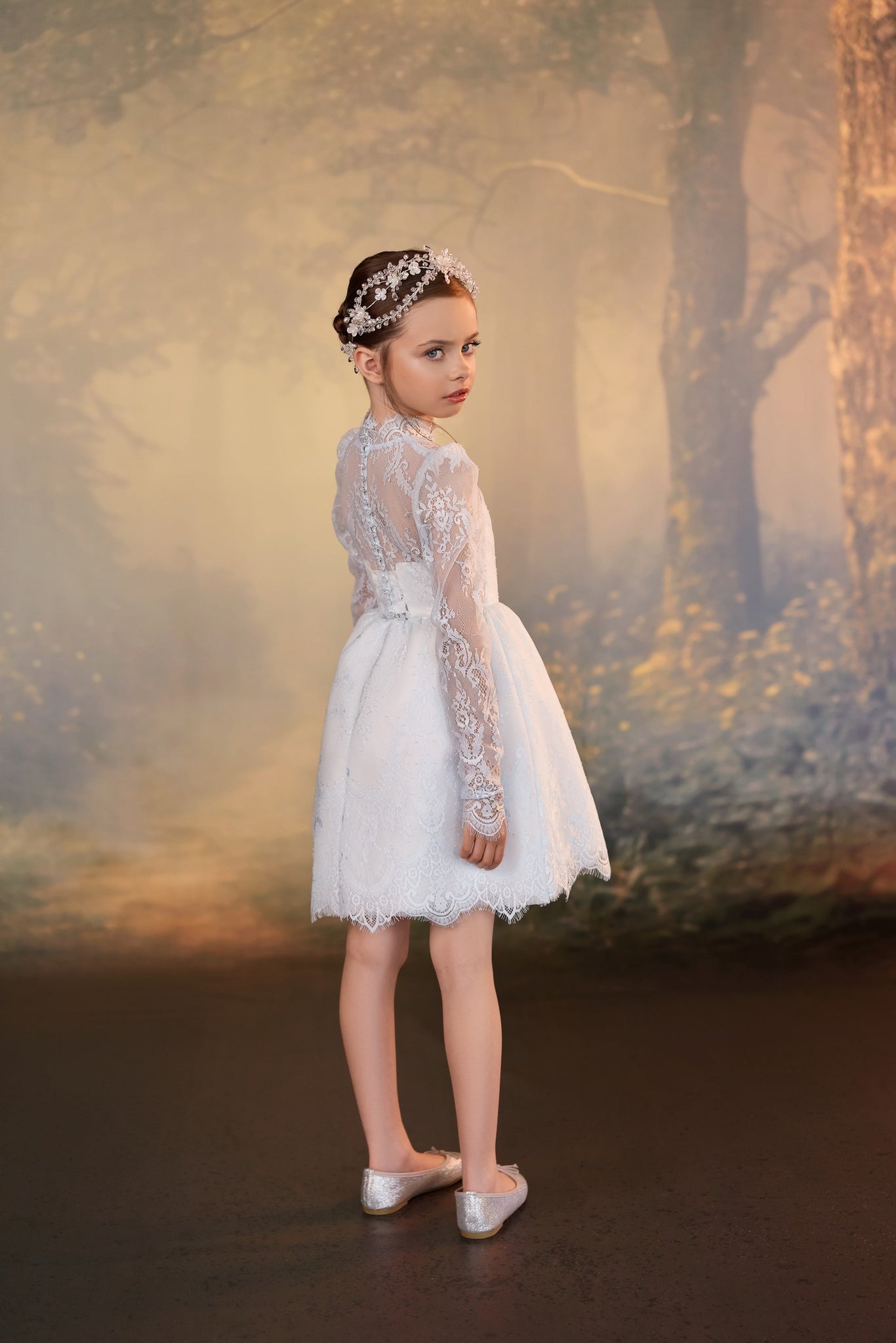 Back view of Pentelei 3945 short lace dress with sheer long sleeves and scalloped hem | Girls Formal Dress