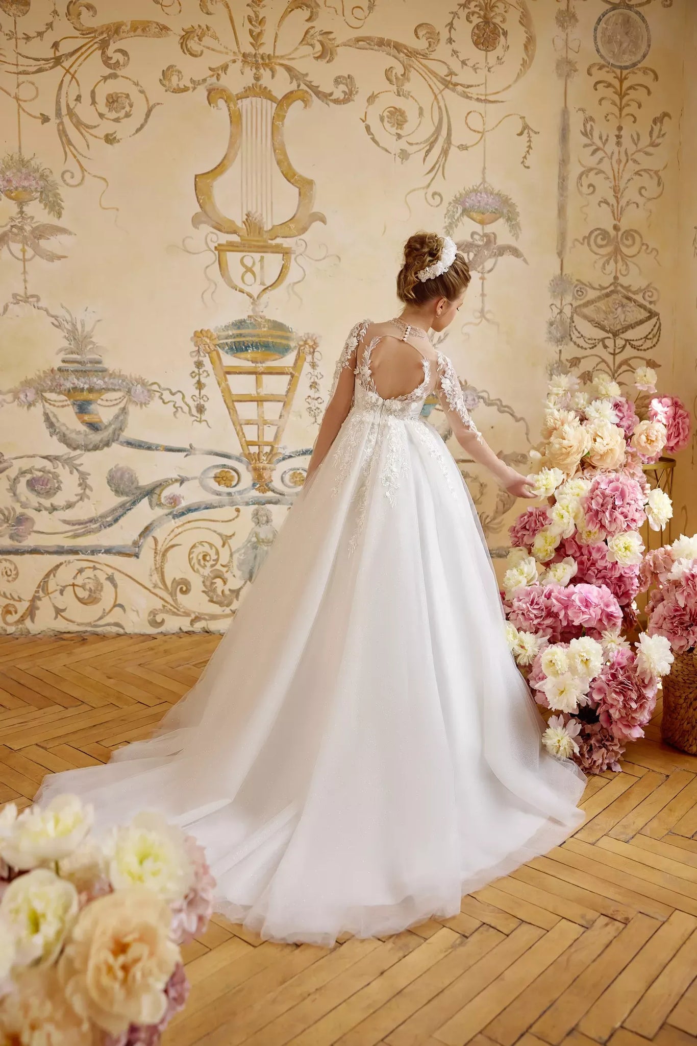 Pentelei 3832 floral applique gown with sheer neckline and open back | Girls Formal Dress