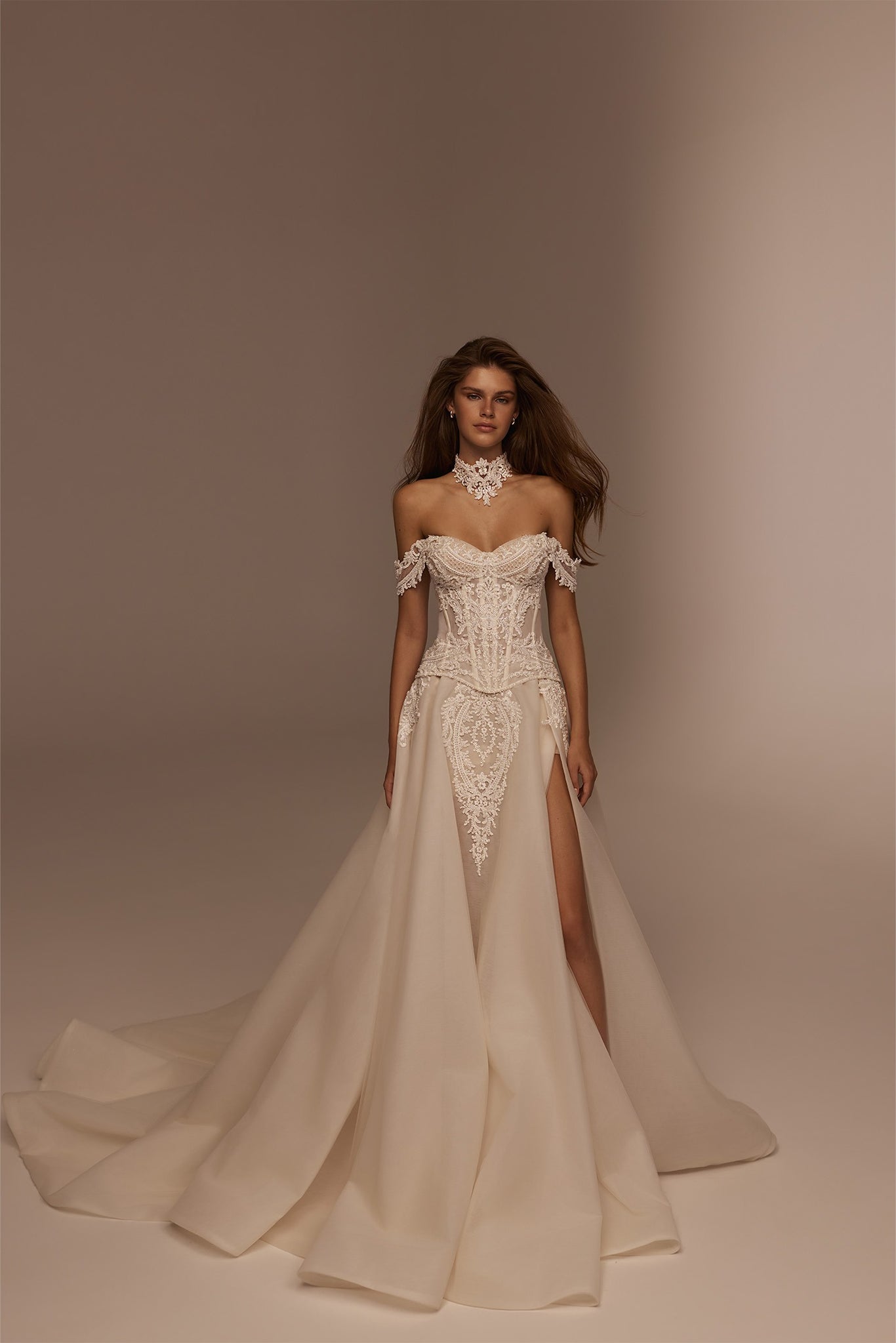 Off shoulder corset wedding dress with lace bodice and high leg slit