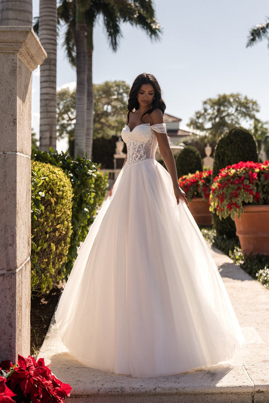 EMABRIDE 261 wedding dress with off-the-shoulder neckline, sheer corset bodice, embroidery, and full A-line skirt
