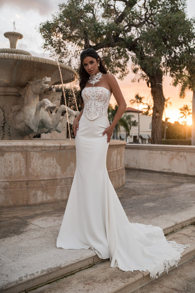 EMABRIDE 269 fitted wedding dress with straight strapless neckline, sculpted corset bodice, floral neck detail, and train