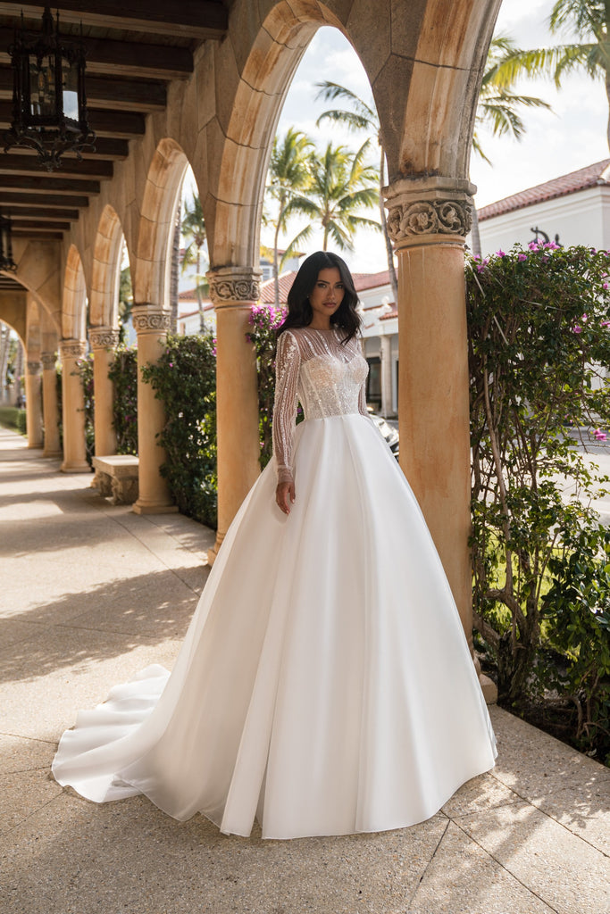 EMABRIDE 277 ball gown wedding dress with sheer high neckline, long sleeves, embellished bodice, and full clean skirt