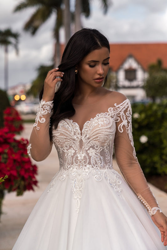 EMABRIDE 263 wedding dress with illusion bodice, deep sweetheart neckline, ornate embroidery, long sleeves, and full A-line skirt