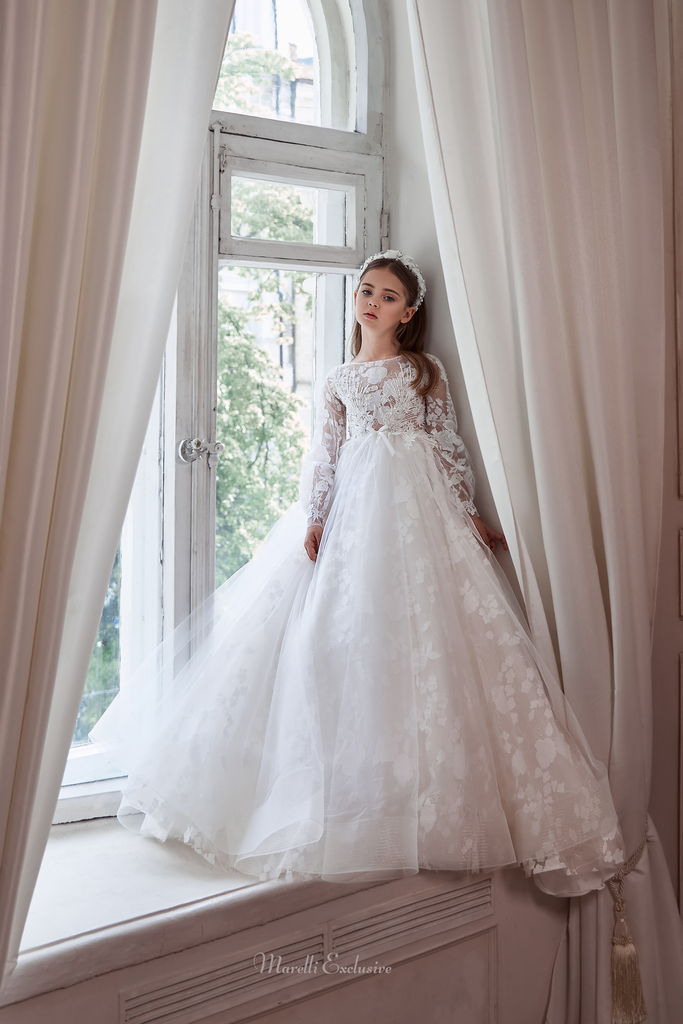 Pentelei 3113 elegance in floral lace: a dress with long lace sleeves and a dramatic train  | Girls Formal Dress